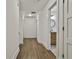 Hallway with view to bathroom and wood floors at 270 Carrolls Way, Fayetteville, GA 30215