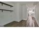 Hallway with view to kitchen and built-in shelving at 270 Carrolls Way, Fayetteville, GA 30215