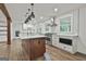 Gourmet kitchen showcases a center island, stainless appliances, and white cabinetry at 270 Carrolls Way, Fayetteville, GA 30215