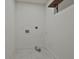 Laundry room with white walls and tile floor at 270 Carrolls Way, Fayetteville, GA 30215
