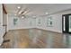 Spacious living room features recessed lighting, wood floors, and several windows at 270 Carrolls Way, Fayetteville, GA 30215