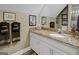 Neutral bathroom features white vanity with granite countertop and patterned towels at 1120 Upchurch Rd, Mcdonough, GA 30252