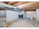 Spacious unfinished basement with exposed ceiling at 405 Abbey Rd, Peachtree City, GA 30269