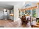 Sunny breakfast nook with large windows and backyard view at 105 Roxbrough Ln, Fayetteville, GA 30215