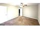 Generous bedroom with neutral walls, ceiling fan, and a spacious closet at 2103 Keheley Dr, Decatur, GA 30032