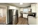 Modern kitchen featuring stainless steel appliances and ample cabinet space at 2103 Keheley Dr, Decatur, GA 30032