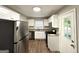 Updated kitchen with stainless steel appliances and granite countertops at 2103 Keheley Dr, Decatur, GA 30032