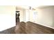 Spacious living area with contemporary flooring and a ceiling fan at 2103 Keheley Dr, Decatur, GA 30032