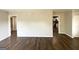 Open-concept living area with modern flooring and neutral wall color at 2103 Keheley Dr, Decatur, GA 30032