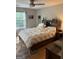 Cozy bedroom with a comfortable bed, soft lighting, and a view of the outdoors at 120 Alfred Dr, Carrollton, GA 30116