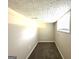 Carpeted bedroom with single window at 3456 Spring Cir, Decatur, GA 30032