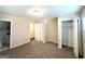 This is a carpeted bedroom with a closet at 3456 Spring Cir, Decatur, GA 30032