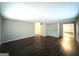Spacious living room with new flooring, neutral paint and ample natural light at 3456 Spring Cir, Decatur, GA 30032