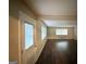 Inviting living space with new floors, and a doorway to an adjoining room at 3456 Spring Cir, Decatur, GA 30032
