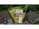 A birdseye view of the home shows the manicured lawn and large yard at 1492 Bourdon Bell Se Dr, Conyers, GA 30013