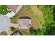 Aerial view displays large lot, grassy land, and an attractive neighborhood at 1492 Bourdon Bell Se Dr, Conyers, GA 30013