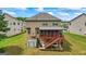 Image featuring the home's exterior with an inviting deck at 1492 Bourdon Bell Se Dr, Conyers, GA 30013