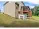 This expansive backyard features a wooden deck and a storage shed at 1492 Bourdon Bell Se Dr, Conyers, GA 30013