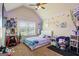 Bedroom featuring vaulted ceilings, a window, and carpet, creating a cozy atmosphere at 1492 Bourdon Bell Se Dr, Conyers, GA 30013