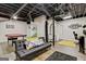 Spacious finished basement with a pool table, seating area, and home office setup at 394 Thornbrooke Dr, Hiram, GA 30141