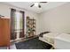 Comfortable bedroom with a built-in bookshelf and natural light at 394 Thornbrooke Dr, Hiram, GA 30141