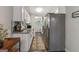 Efficient kitchen design with modern stainless steel appliances, granite countertops, and ample storage at 394 Thornbrooke Dr, Hiram, GA 30141