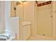 Bathroom featuring a shower, vanity, mirror, and decorative wallpaper at 4135 Coursey Lake Rd, Douglasville, GA 30135