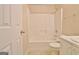 Clean and functional bathroom featuring a tub/shower combo and neutral fixtures at 4135 Coursey Lake Rd, Douglasville, GA 30135