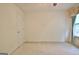 Neutral bedroom featuring carpeting, a ceiling fan and window at 4135 Coursey Lake Rd, Douglasville, GA 30135