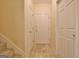 Hallway with ceramic tile, with entrances to other rooms at 4135 Coursey Lake Rd, Douglasville, GA 30135