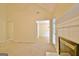 Spacious living room with high ceilings and fireplace, plus a view to an adjacent dining room at 4135 Coursey Lake Rd, Douglasville, GA 30135