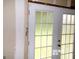 Basement featuring a set of white French doors leading to the exterior at 2225 Blue Ridge Ln, Conyers, GA 30012