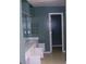 Bathroom featuring a vanity and a doorway at 2225 Blue Ridge Ln, Conyers, GA 30012