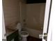 Bathroom featuring a tub and toilet ready for your personal touches at 2225 Blue Ridge Ln, Conyers, GA 30012