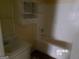 Small bathroom featuring a vanity and a tub with shower at 2225 Blue Ridge Ln, Conyers, GA 30012