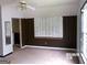 Bedroom with a ceiling fan, a window, and a whiteboard on the wall at 2225 Blue Ridge Ln, Conyers, GA 30012
