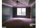 Bedroom featuring a ceiling fan and a window at 2225 Blue Ridge Ln, Conyers, GA 30012