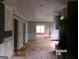 Open kitchen with a view into another room, featuring neutral tones and ample space at 2225 Blue Ridge Ln, Conyers, GA 30012