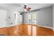 Bright bedroom with hardwood floors, ceiling fan, and natural light at 537 Country Lake Dr, Mcdonough, GA 30252