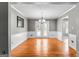 Dining room with hardwood floors and a chandelier with french doors leading to the outside at 537 Country Lake Dr, Mcdonough, GA 30252