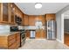 Kitchen featuring stainless steel appliances, granite countertops, and custom wood cabinetry at 537 Country Lake Dr, Mcdonough, GA 30252
