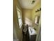 Half bathroom with a sink, toilet, large mirror, and a window for natural light at 1932 Pharrs Rd, Snellville, GA 30078
