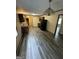 Eat-in kitchen with dark cabinetry, granite countertops, and sleek black appliances at 1932 Pharrs Rd, Snellville, GA 30078