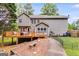 Inviting backyard featuring a spacious deck, perfect for outdoor relaxation and entertaining guests at 90 Thomas Overby Dr, Sharpsburg, GA 30277