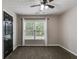 This bedroom features natural light from the window and neutral walls, offering a calming atmosphere at 90 Thomas Overby Dr, Sharpsburg, GA 30277