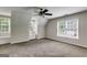 Spacious bedroom with cozy carpeting, offering versatile space for various design options at 90 Thomas Overby Dr, Sharpsburg, GA 30277