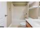 Bathroom with tile floors and a bathtub with shower at 275 Autry Mill Ln, Suwanee, GA 30024