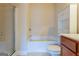 Clean bathroom with a glass shower and a cabinet at 275 Autry Mill Ln, Suwanee, GA 30024