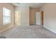 Spacious carpeted bedroom with ensuite bathroom and walk-in closet at 275 Autry Mill Ln, Suwanee, GA 30024