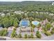 Aerial view of the neighborhood amenities including pool, tennis courts, and playground at 733 Wexford Cove Way, Mableton, GA 30126